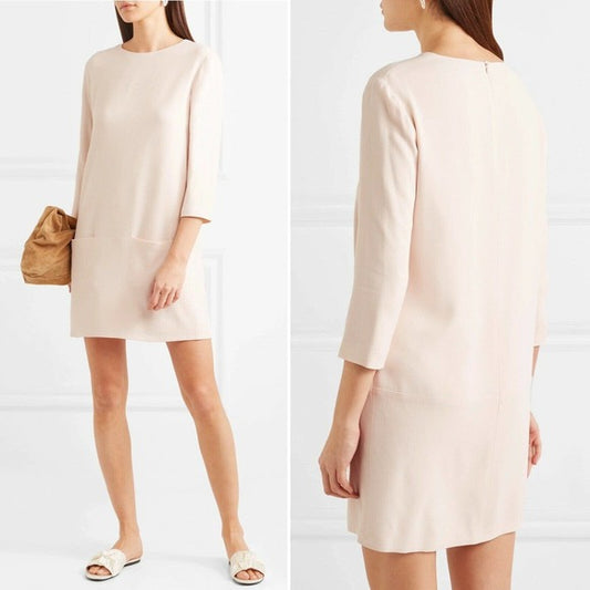 The Row cream midi dress with two front pockets