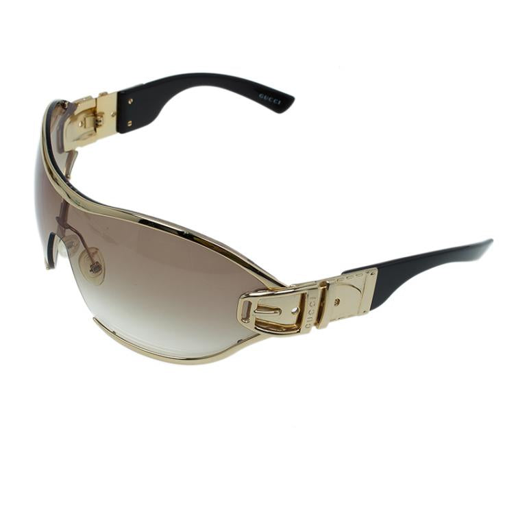 GUCCI large frame sunglesses, gold rim, gold side that looks like belt buckle