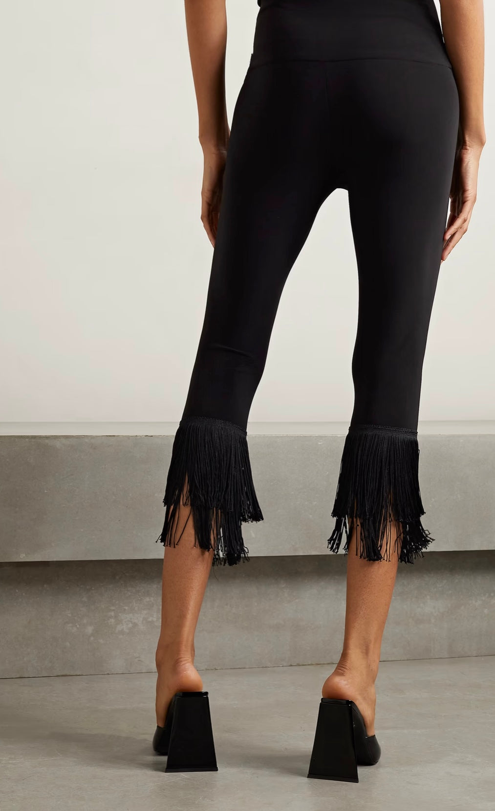 NORMA KAMALI
Cropped fringed stretch-jersey leggings