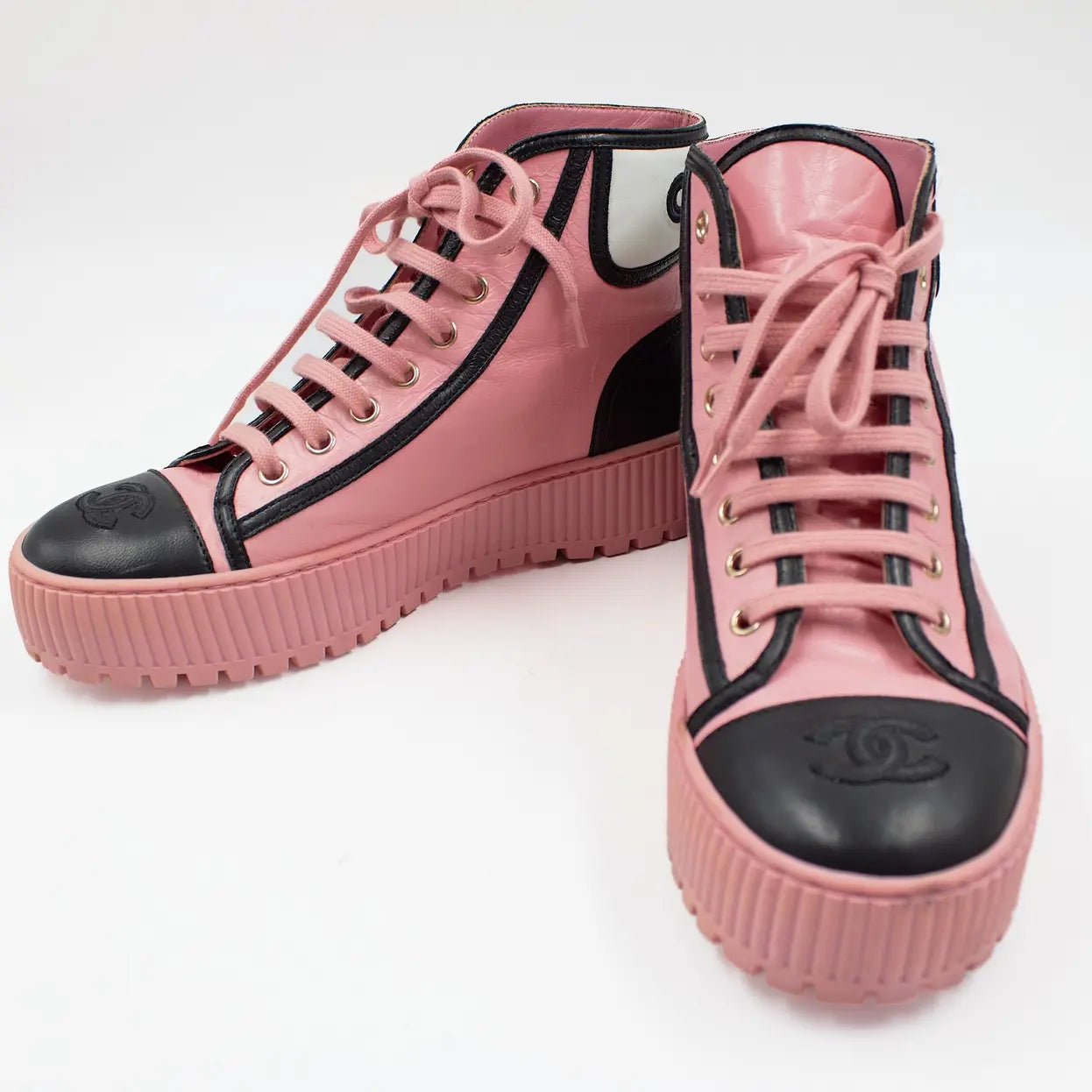CHANEL pink leather hightop sneakers