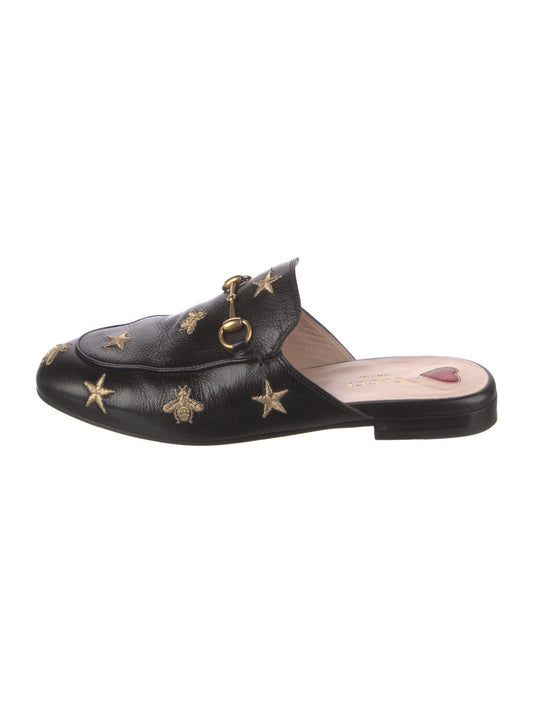 GUCCI prince-town mules with gold stars