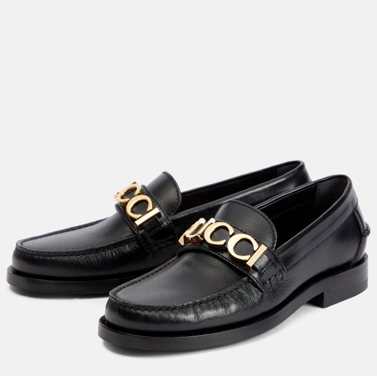 GUCCI
Logo leather loafers