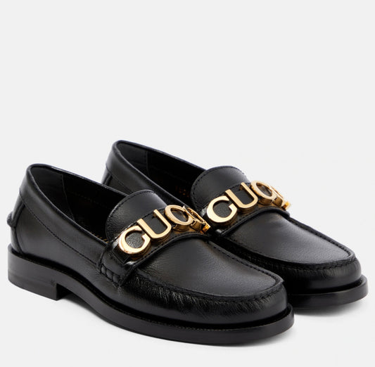 GUCCI
Logo leather loafers