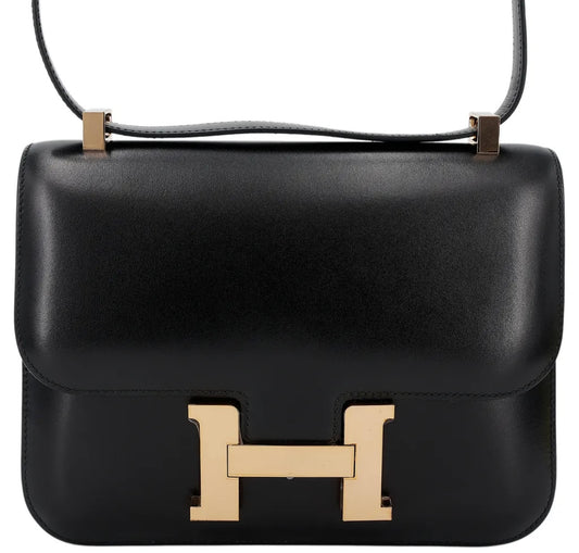 HERMÈS - Constance 24 shoulder bag in Black Box calfskin with Rose Gold hardware