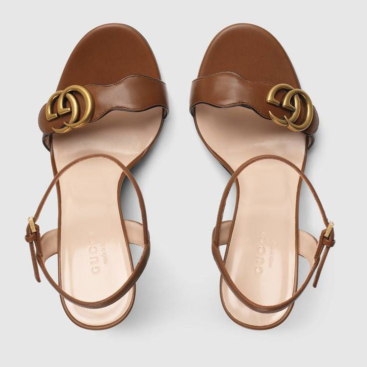 GUCCI brown leather flats with GHW logo