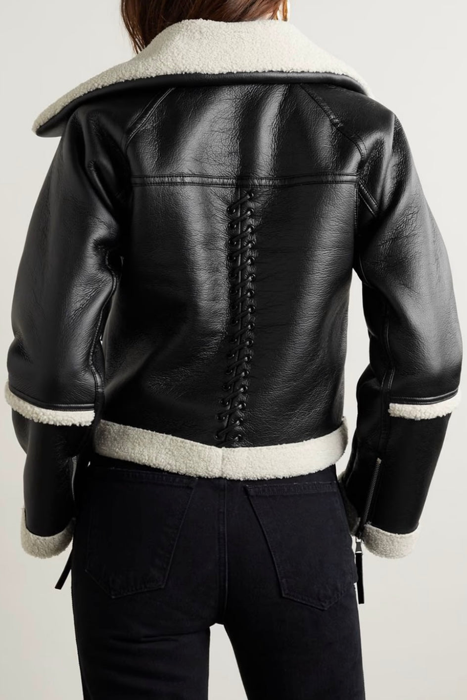 SIMKHAI
Corinne whipstitched faux shearling biker jacket