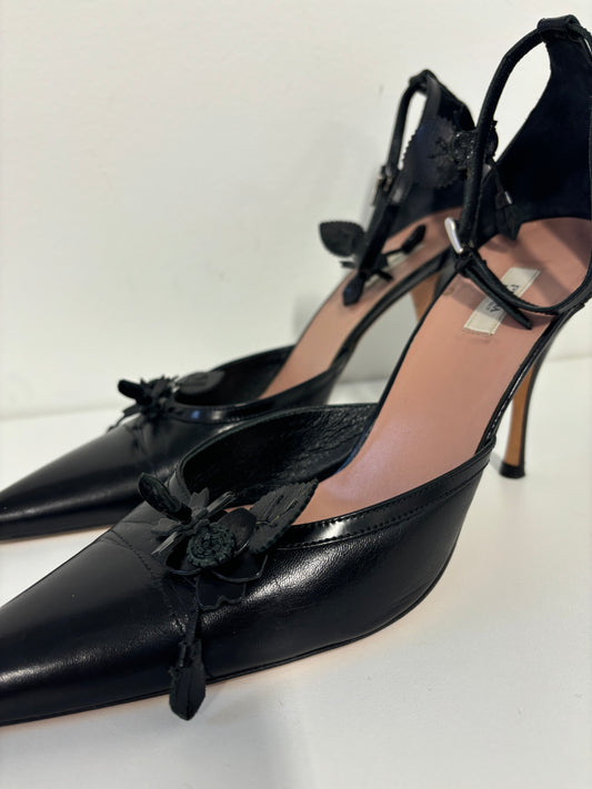 PRADA black ankle strap pumps with floral detail