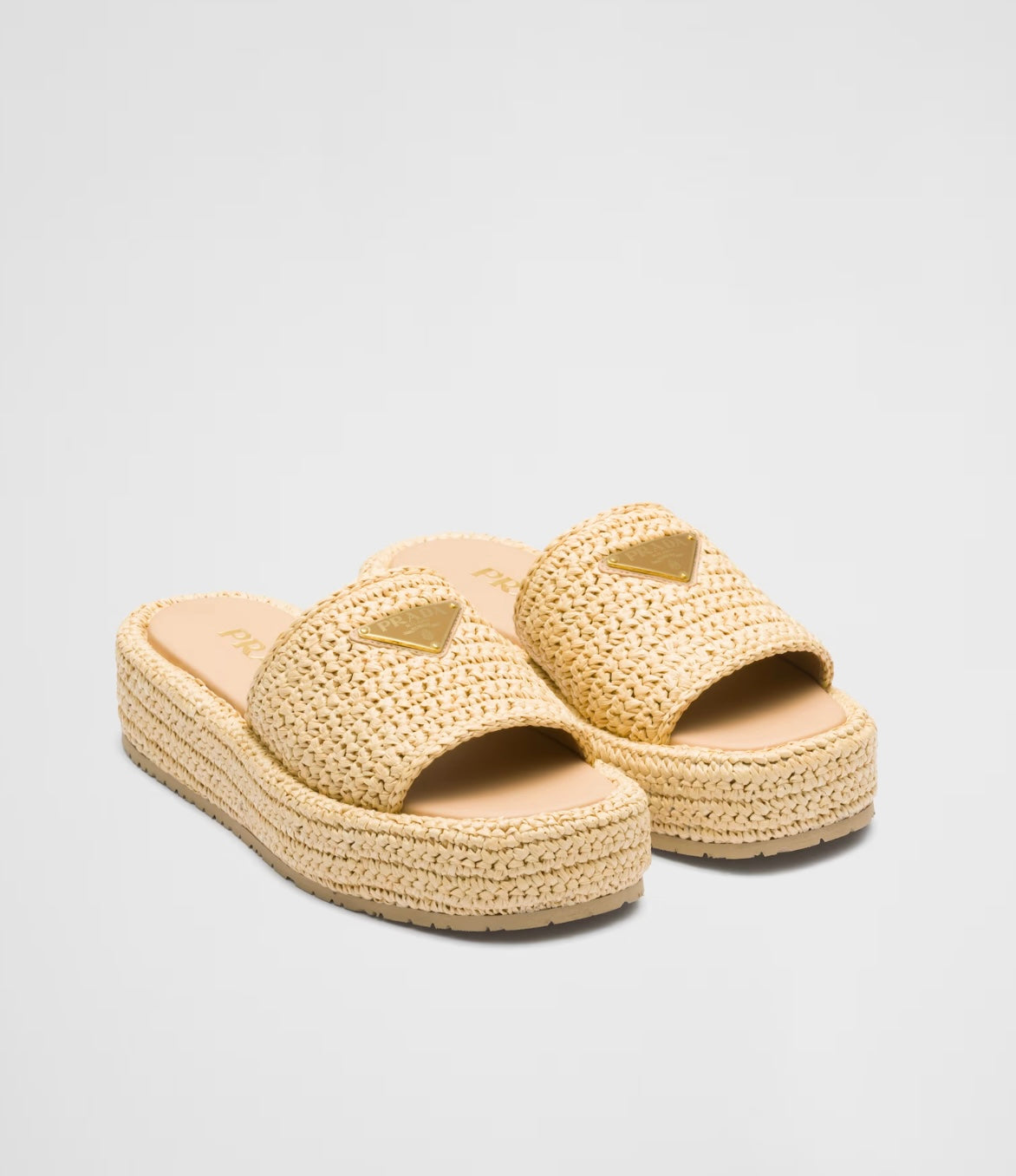 PRE-LOVED PRADA
Raffia Flatform Slide Sandals