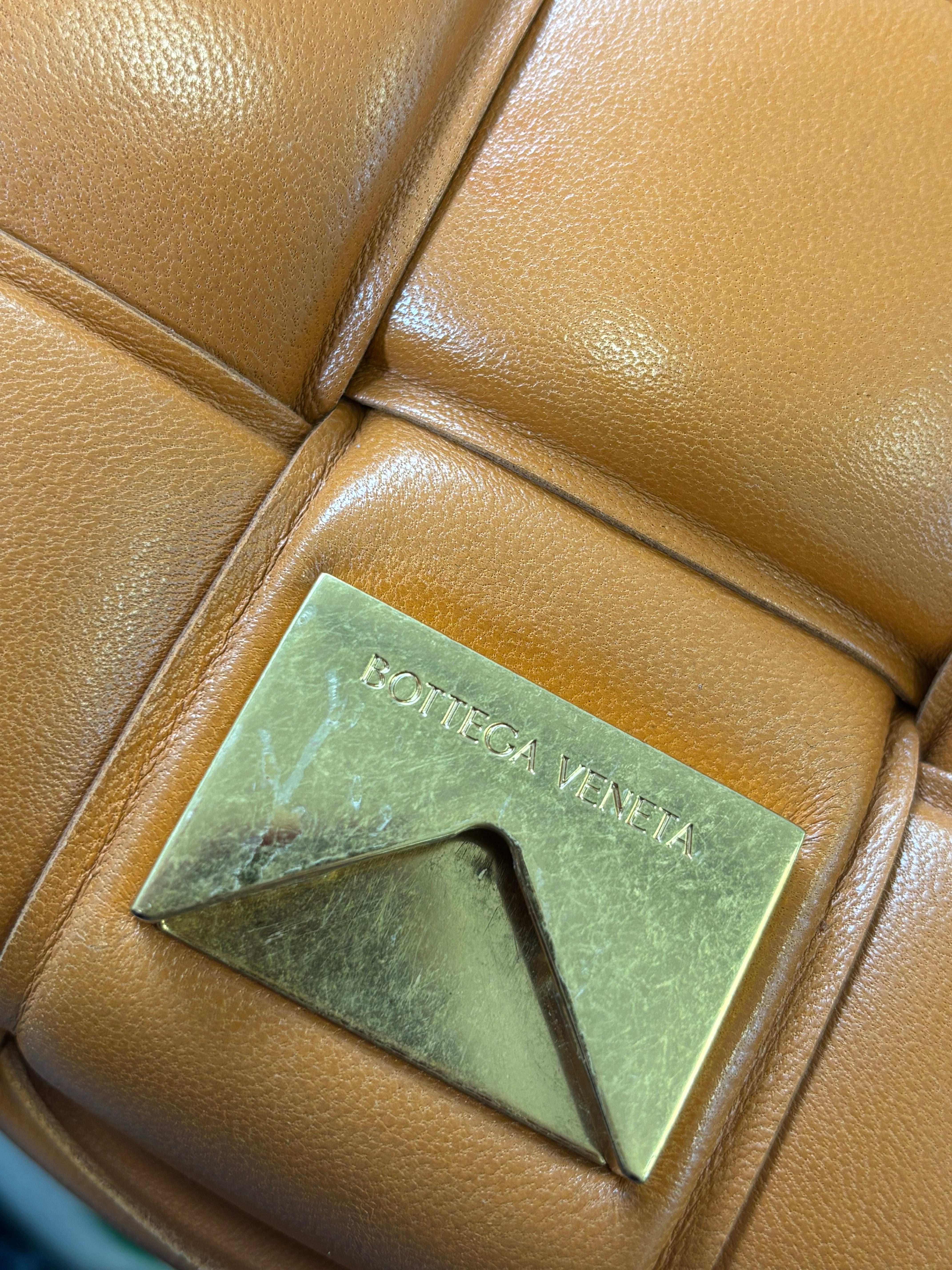 BOTTEGA VENETA padded orange cassette crossbody bag