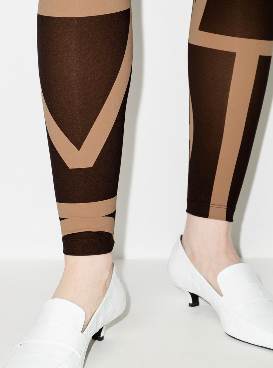 TOTEME
high-waisted monogram leggings