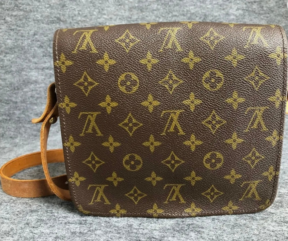 Authentic Louis Vuitton
Monogram Cartouchiere