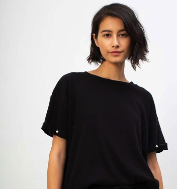 DONNI black tee with pearls on sleeve