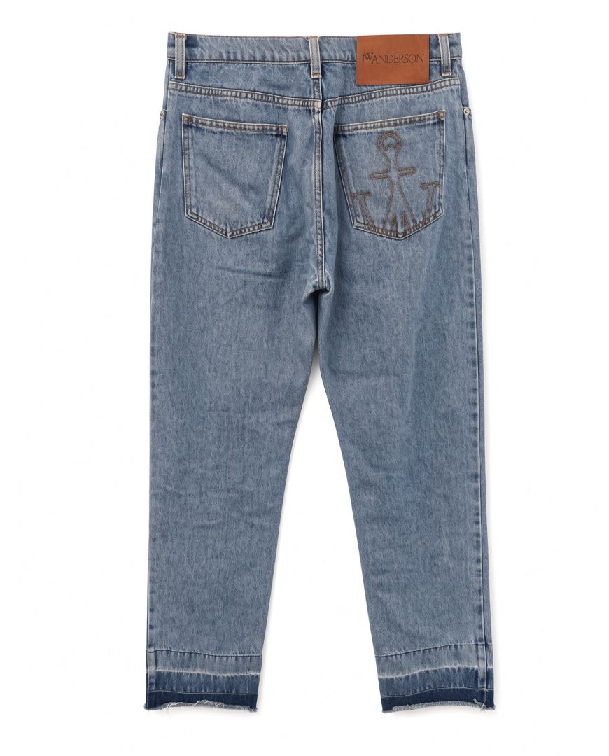 JW Anderson Light Wash Button Fly Jeans with Dip Dye Raw Hem