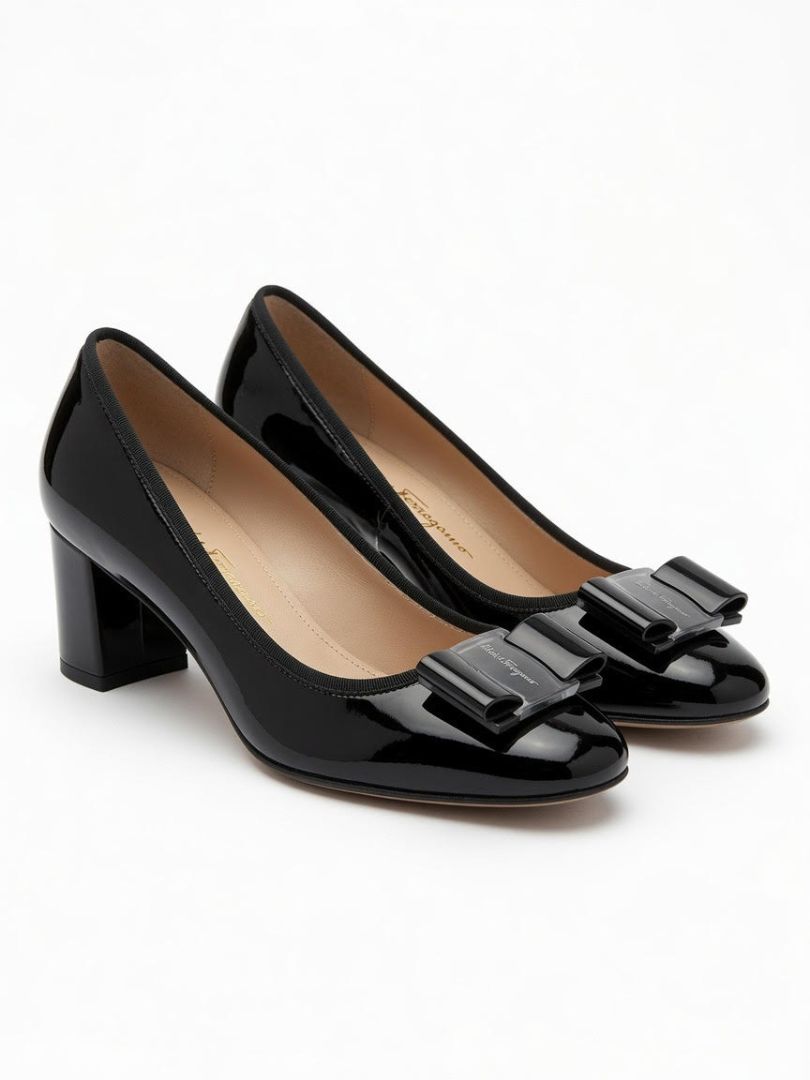 FERRAGAMO black patent round toe heels with bow